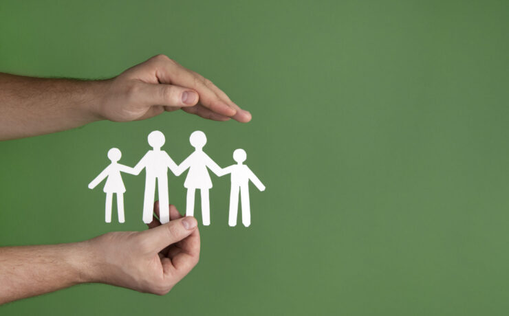 hand-holding-paper-people-close-up